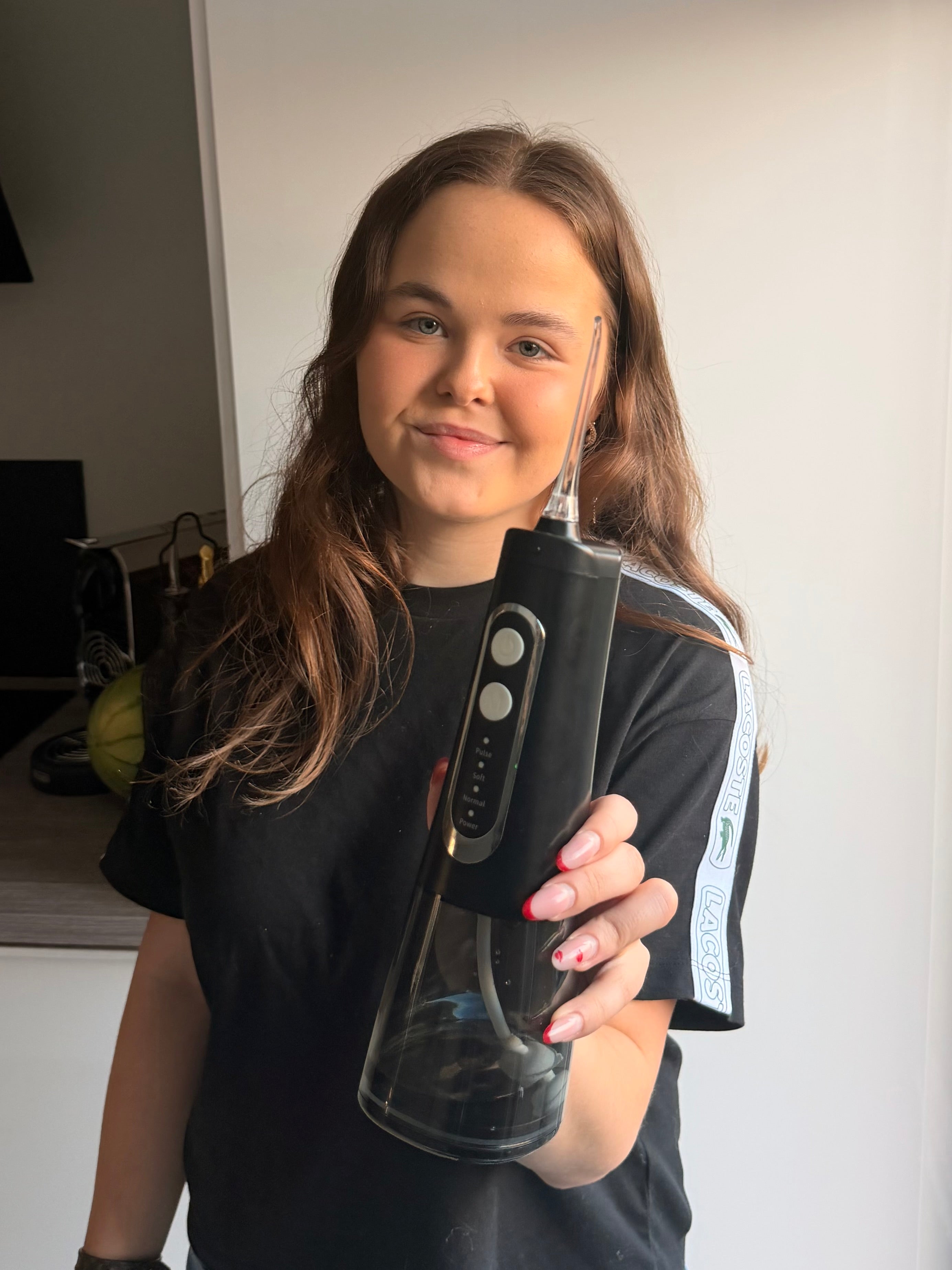 Er waterflosser bedre end tandtråd?